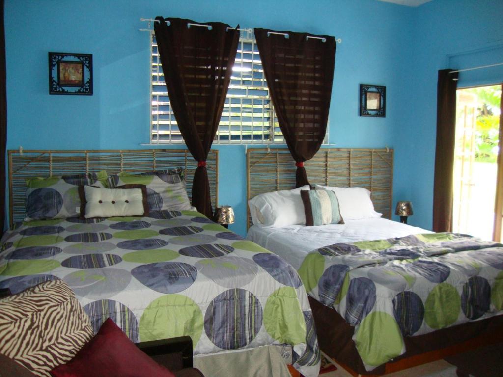 By The Sea Vacation Home And Villa ปอร์ตอันโตนิโอ ห้อง รูปภาพ