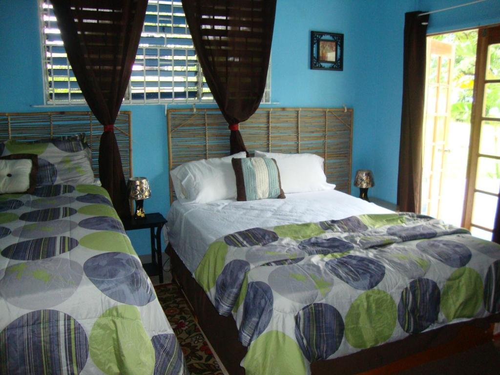 By The Sea Vacation Home And Villa ปอร์ตอันโตนิโอ ห้อง รูปภาพ