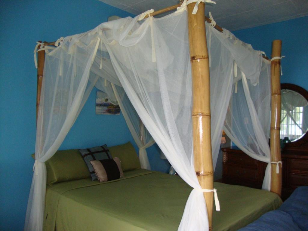 By The Sea Vacation Home And Villa ปอร์ตอันโตนิโอ ห้อง รูปภาพ